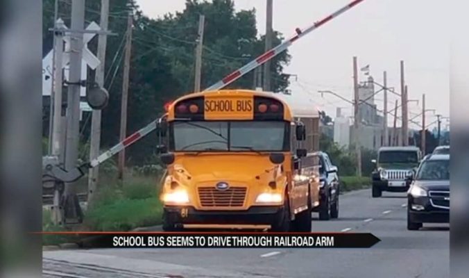 South Bend School bus caught on camera under railroad crossing arm - 95 ...