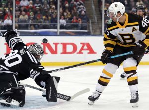 Pastrnak, Bruins beat Blackhawks 4-2 in Winter Classic