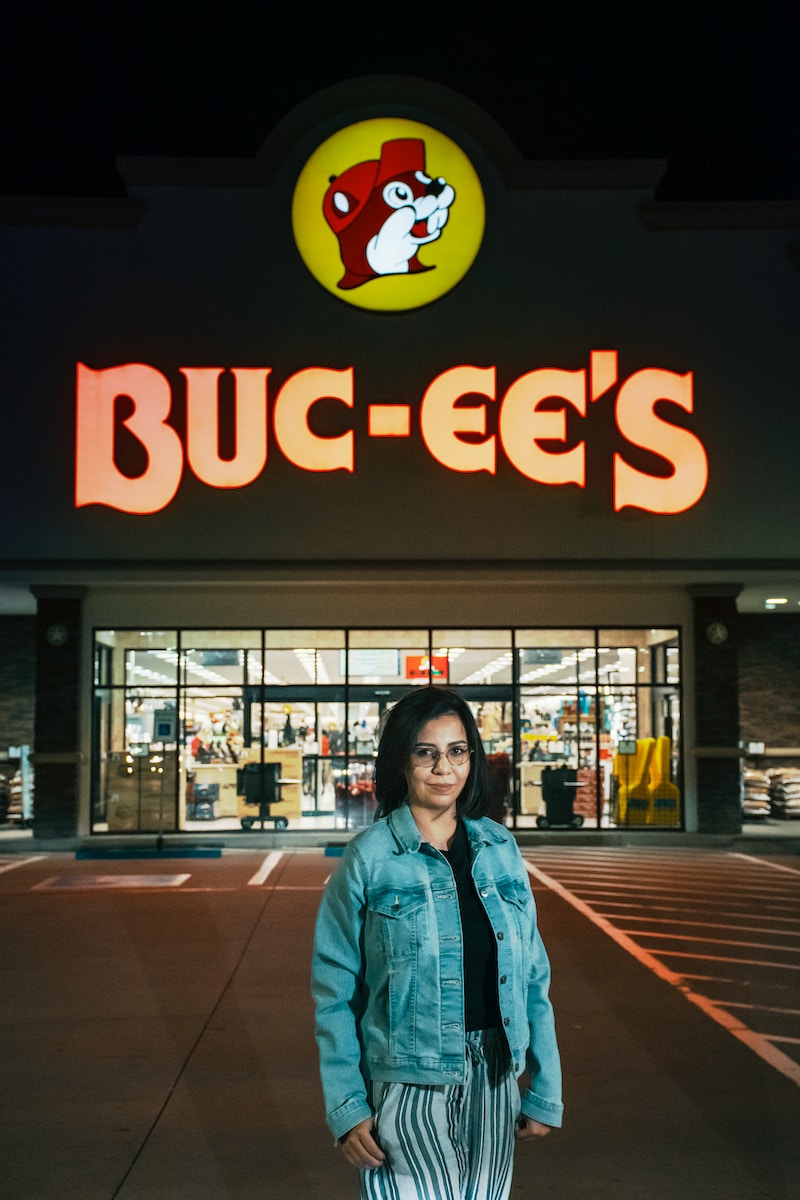 a person standing in front of a store