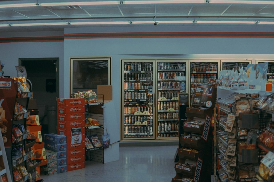 crates in store near refrigerator